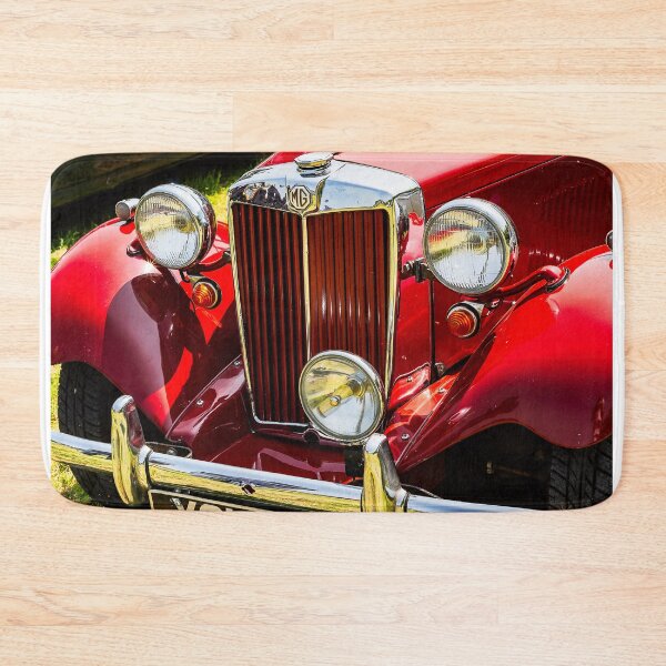 Item preview, An image of the front of a red MG TA on display at a car show designed and sold by Graham Cornall.