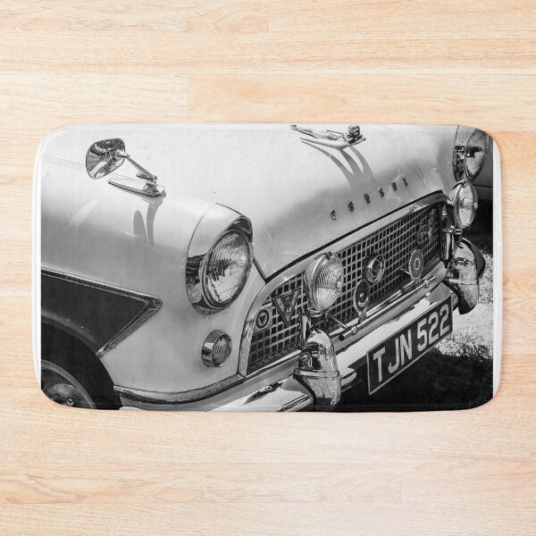 Item preview, A black and white image of the front of a 1959 Ford Consul MK2 on display at a car show designed and sold by Graham Cornall.