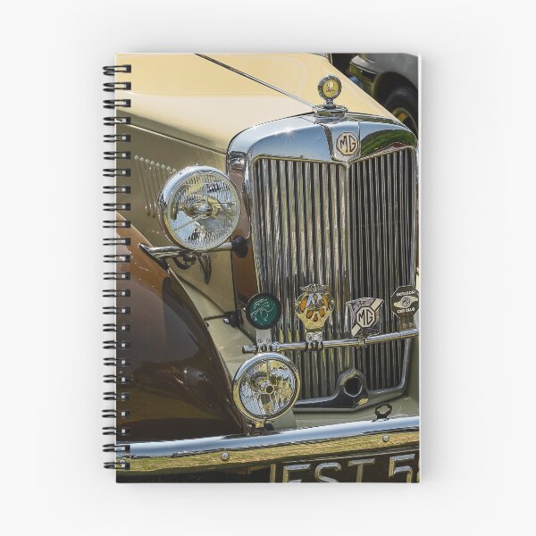 Item preview, The front of a brown and cream 1952 MG TD roadster on display at a car show designed and sold by Graham Cornall.