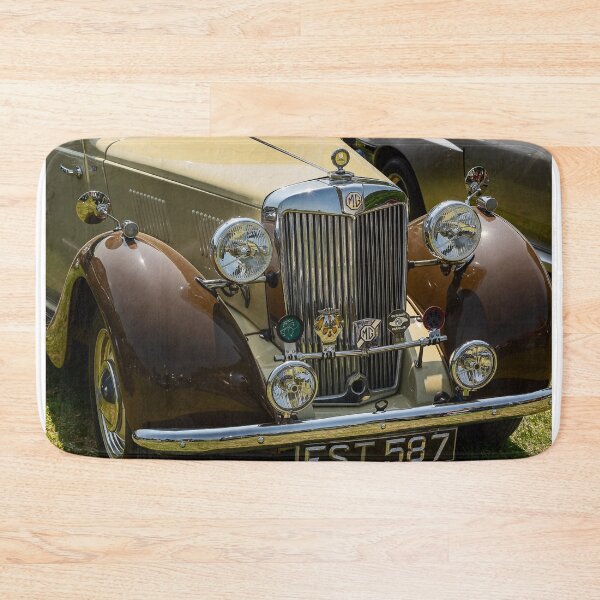 Item preview, The front of a brown and cream 1952 MG TD roadster on display at a car show designed and sold by Graham Cornall.