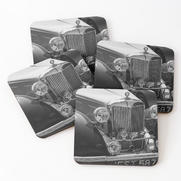 Item preview, A black and white image of the front of a 1952 MG TD roadster on display at a car show designed and sold by Graham Cornall.