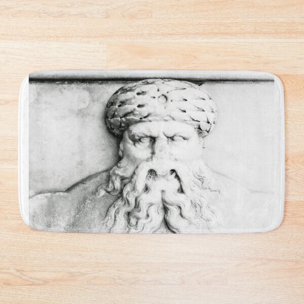 Item preview, A worn and weathered stone face of a man with a turban hat and beard. designed and sold by simpson92.
