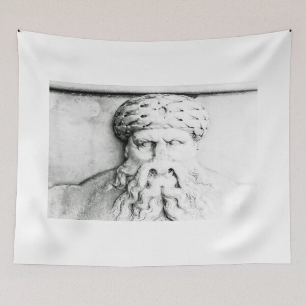 Item preview, A worn and weathered stone face of a man with a turban hat and beard. designed and sold by simpson92.