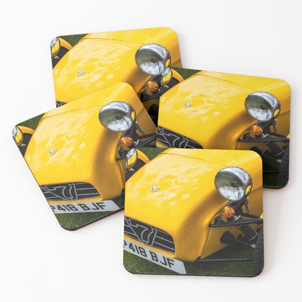 Item preview, The front of a yellow 1996 Caterham Super 7 on display at a car show designed and sold by Graham Cornall.