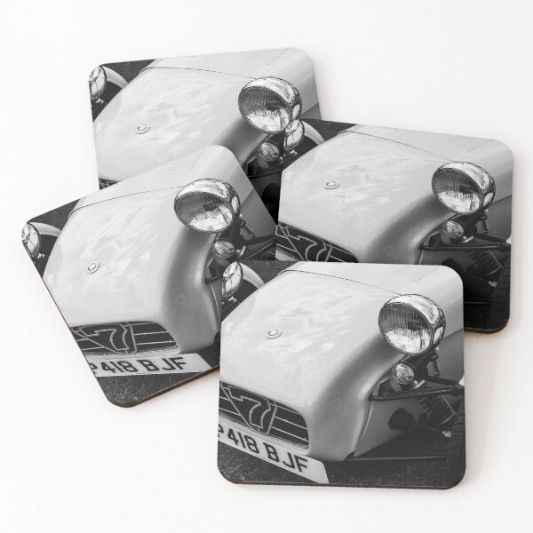 Item preview, A black and white image of the front of a 1996 Caterham Super 7 on display at a car show designed and sold by Graham Cornall.