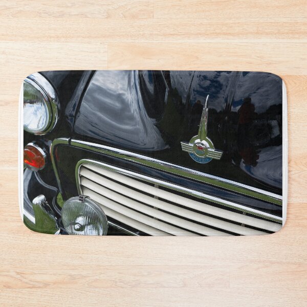Item preview, The front of a black 1967 Morris Minor Traveller on display at a car show designed and sold by Graham Cornall.