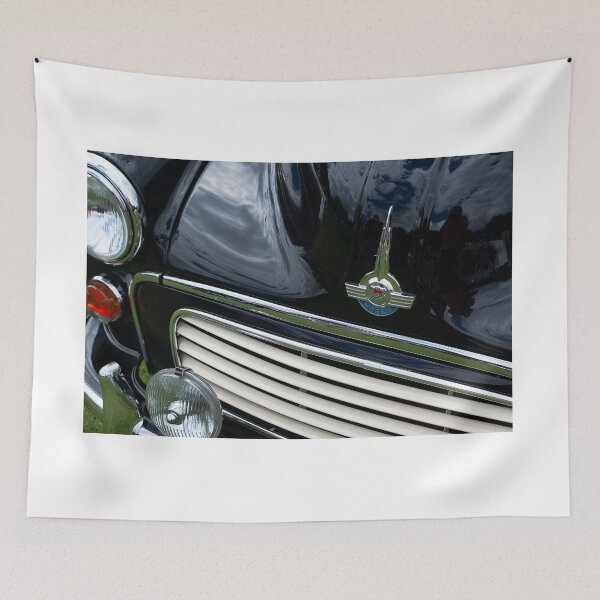 Item preview, The front of a black 1967 Morris Minor Traveller on display at a car show designed and sold by Graham Cornall.