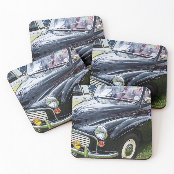 Item preview, The front of a black 1967 Morris Minor Traveller on display at a car show designed and sold by Graham Cornall.