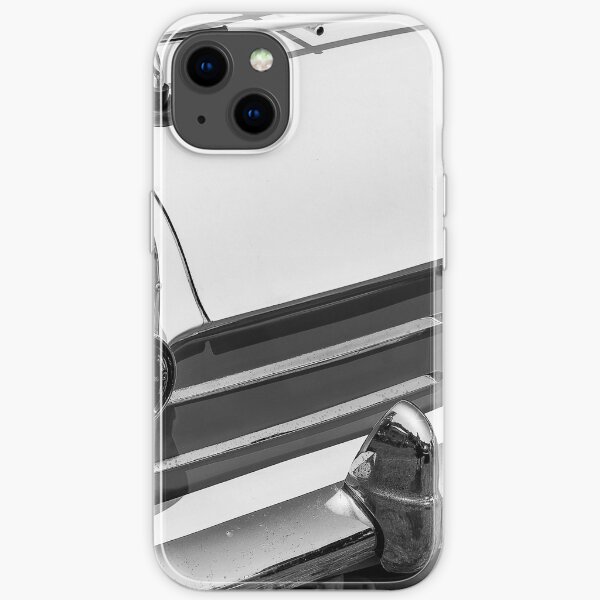 "A black and white image of the back of a 1959 Ford Consul MK2 on display at a car show" iPhone