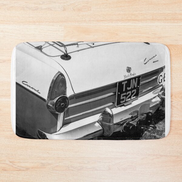 Item preview, A black and white image of the back of a 1959 Ford Consul MK2 on display at a car show designed and sold by Graham Cornall.