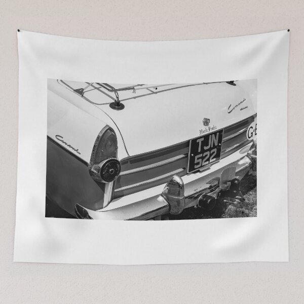 Item preview, A black and white image of the back of a 1959 Ford Consul MK2 on display at a car show designed and sold by Graham Cornall.