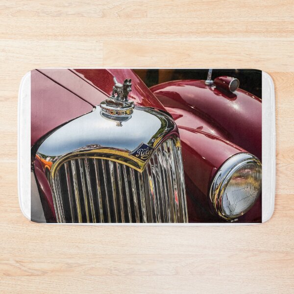 Item preview, The front of a red vintage Riley on display at a car show designed and sold by Graham Cornall.