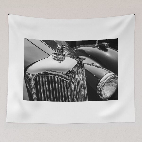 Item preview, A black and white image of the front of a vintage Riley on display at a car show designed and sold by Graham Cornall.