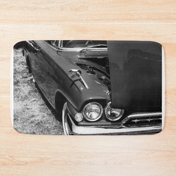 Item preview, A black and white image of the front of a red 1960s Ford Consul Classic on display at a car show designed and sold by Graham Cornall.