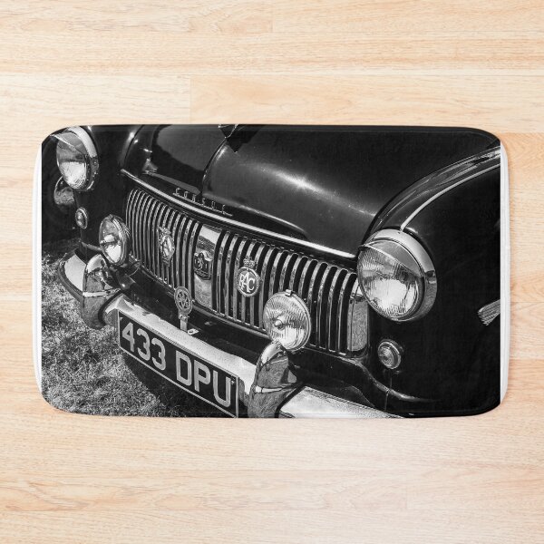 Item preview, A black and white image of the front of a black 1955 Ford Consul on display at a car show designed and sold by Graham Cornall.