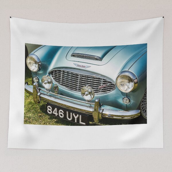 Item preview, The front of a blue 1960 Austin Healey on display at a car show designed and sold by Graham Cornall.