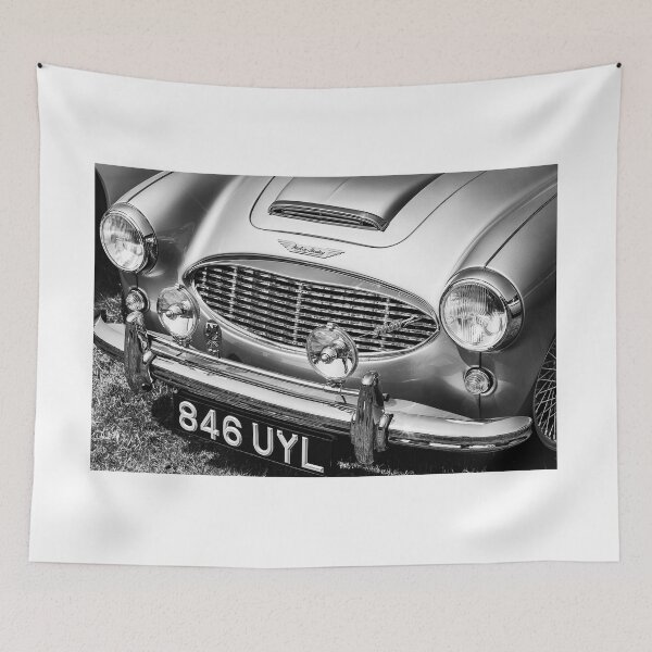 Item preview, A black and white image of the front of a 1960 Austin Healey on display at a car show designed and sold by Graham Cornall.