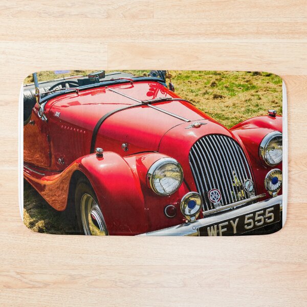 Item preview, The front of a red 1962 Morgan Plus 4 on display at a car show designed and sold by Graham Cornall.