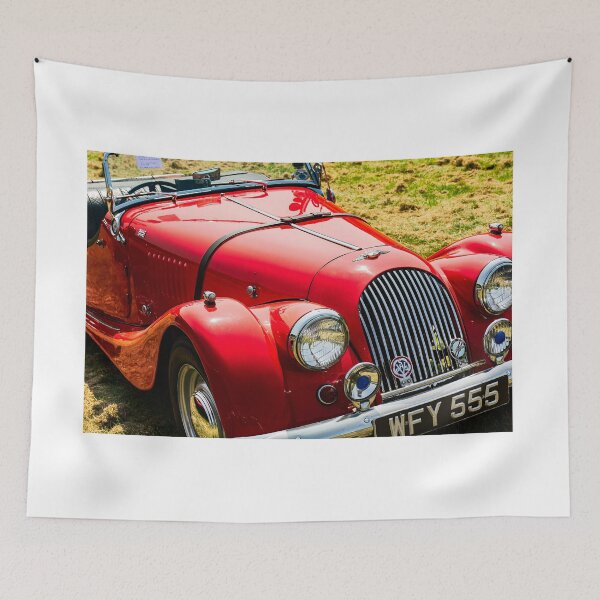 Item preview, The front of a red 1962 Morgan Plus 4 on display at a car show designed and sold by Graham Cornall.