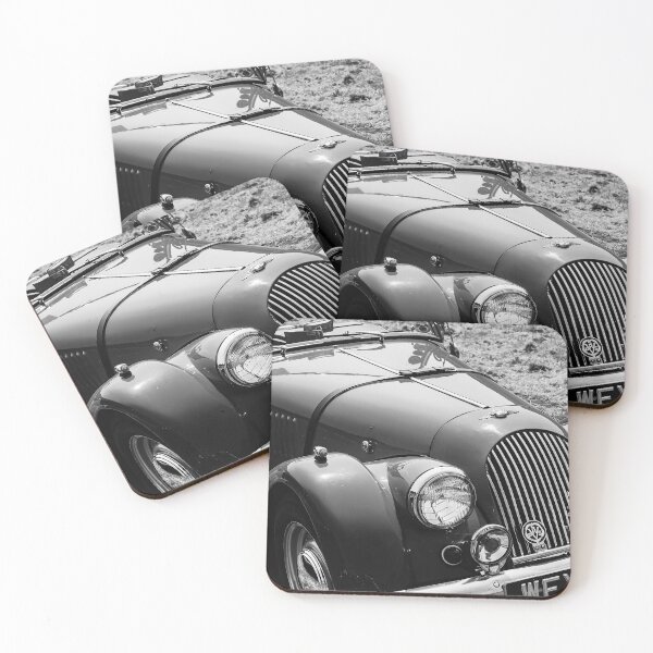 Item preview, A black and white image of the front of a 1962 Morgan Plus 4 on display at a car show designed and sold by Graham Cornall.