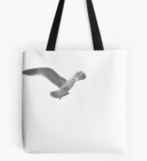 Seagull in Flight on a Overcast Day Tote Bag