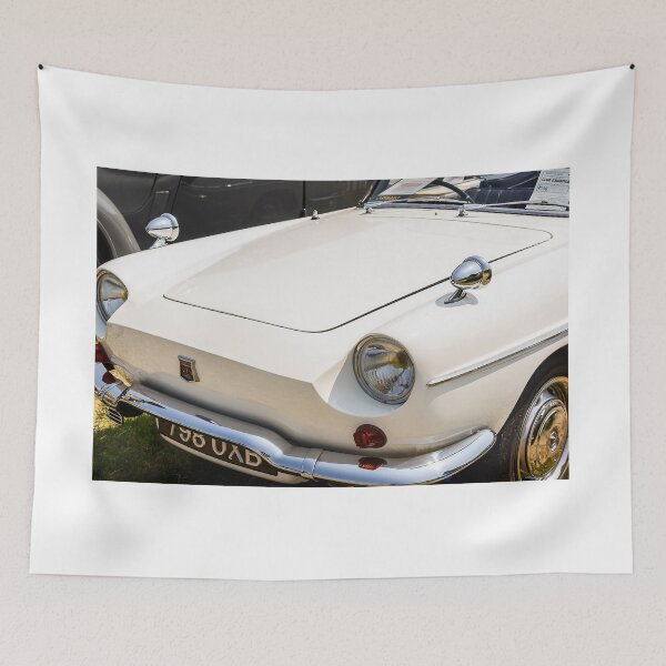 Item preview, The front of a white 1962 Renault Caravelle on display at a car show designed and sold by Graham Cornall.