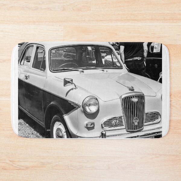 Item preview, A black and white image of the front of a 1950s Wolsely 1500 on display at a car show designed and sold by Graham Cornall.