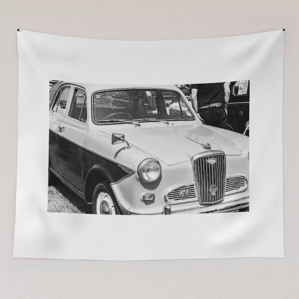 Item preview, A black and white image of the front of a 1950s Wolsely 1500 on display at a car show designed and sold by Graham Cornall.
