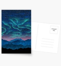 Postales Aurora boreal sobre montañas
