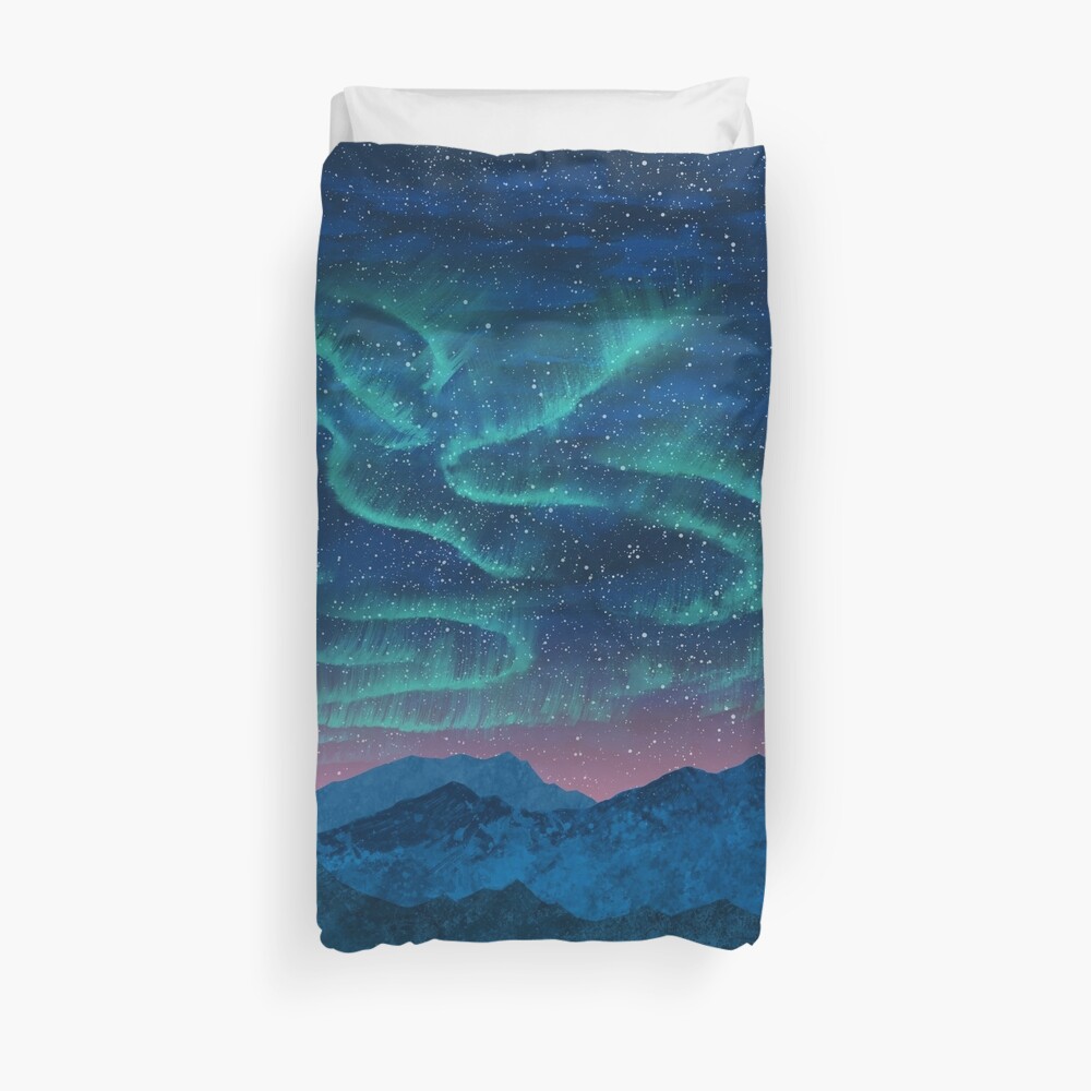 Aurora borealis over mountains Duvet Cover