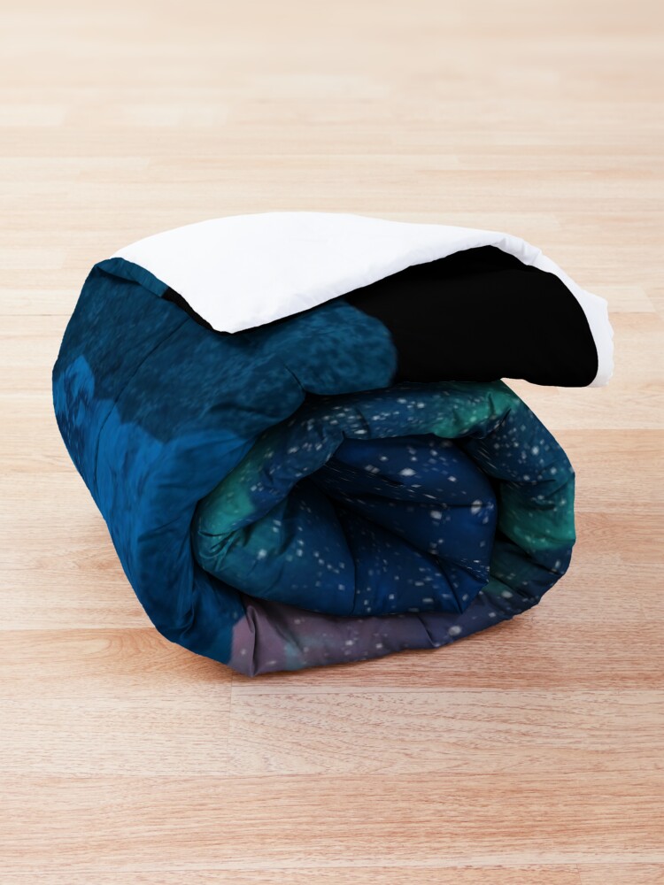 Alternate view of Aurora borealis over mountains Comforter