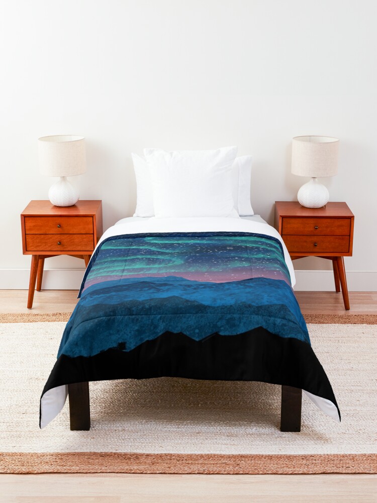Alternate view of Aurora borealis over mountains Comforter