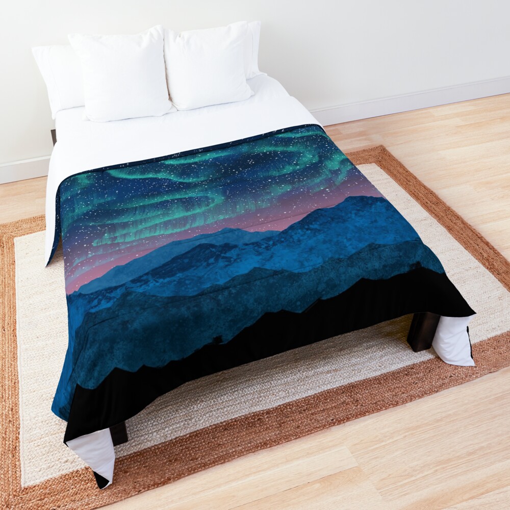 Aurora borealis over mountains Comforter