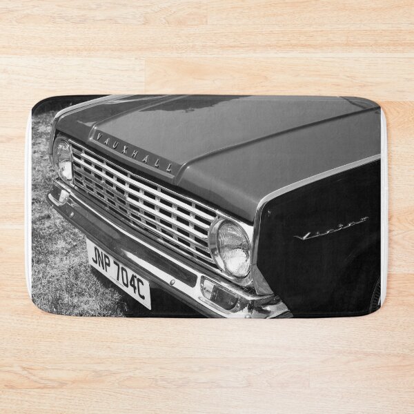 Item preview, A black and white image of the front of a 1965 Vauxall Victor on display at a car show designed and sold by Graham Cornall.