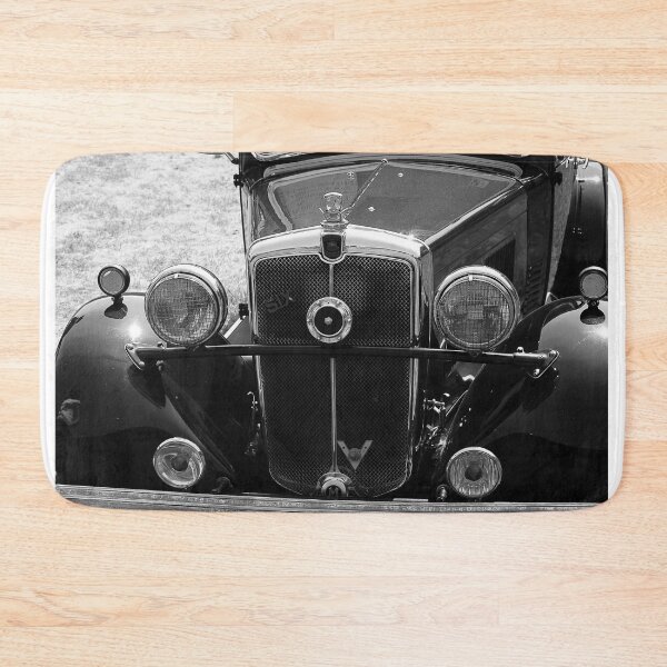 Item preview, A black and white image of the front of a 1930s Morris 10/6 on display at a car show designed and sold by Graham Cornall.