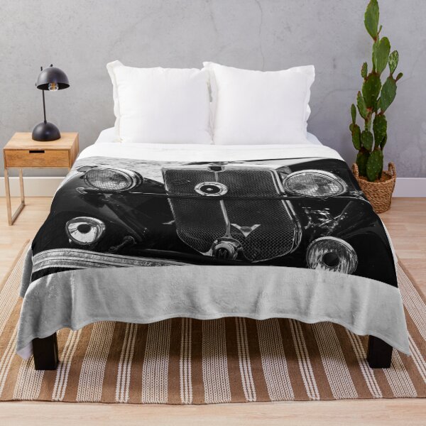 Item preview, A black and white image of the front of a 1930s Morris 10/6 on display at a car show designed and sold by Graham Cornall.