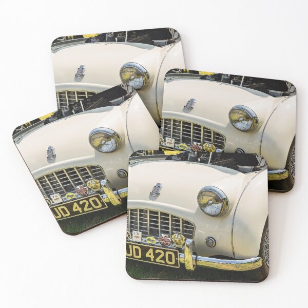 Item preview, The front of a white 1950s Triumph TR3 on display at a car show designed and sold by Graham Cornall.