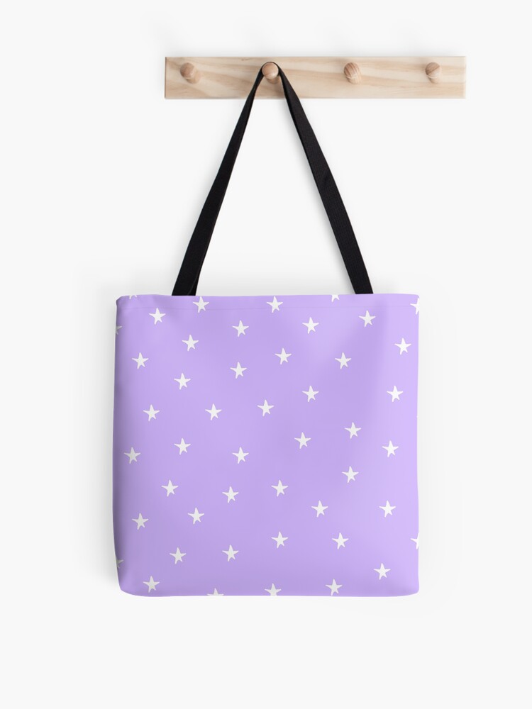 Purple circle star shape with optical art effect, flourish object on dark  purple background Tote Bag
