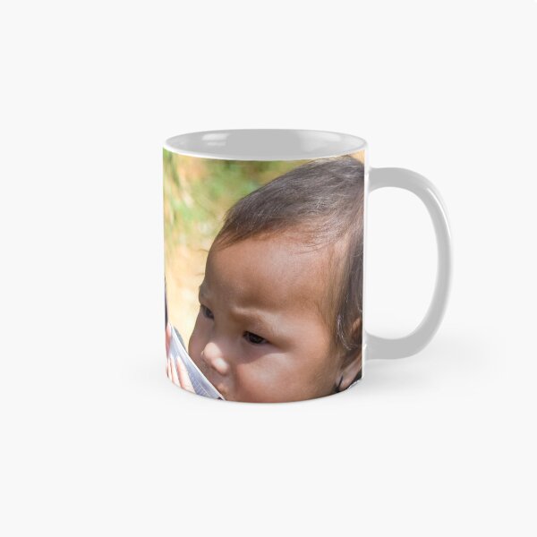 Item preview, Vietnamese Hill-tribe girl and her baby brother designed and sold by Kezzles.