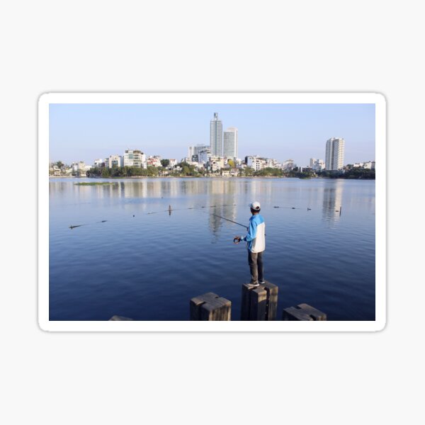 Vietnamese man fishing in Truc Bach Lake, Hanoi Sticker