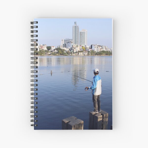 Vietnamese man fishing in Truc Bach Lake, Hanoi Spiral Notebook
