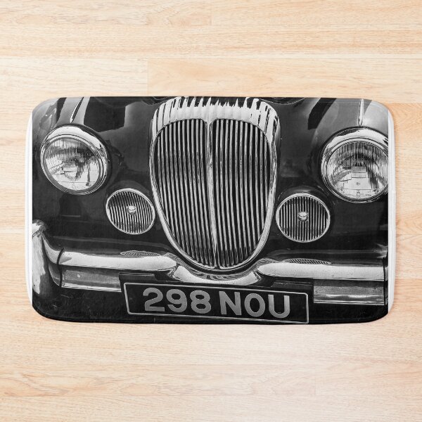 Item preview, A black and white image of the front of a 1964 Daimler 2.5L saloon on display at a car show designed and sold by Graham Cornall.