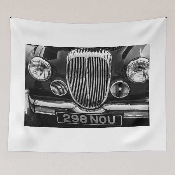 Item preview, A black and white image of the front of a 1964 Daimler 2.5L saloon on display at a car show designed and sold by Graham Cornall.