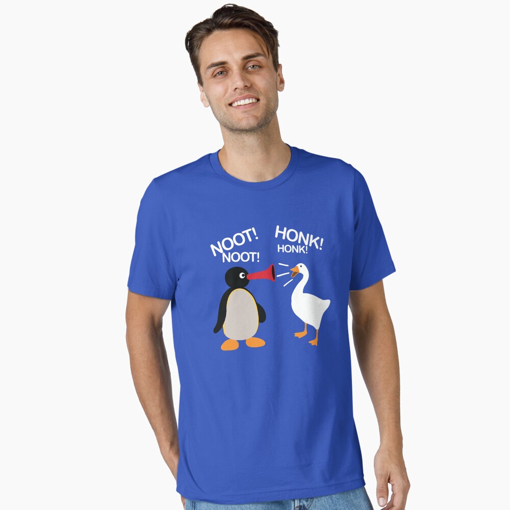 Vista previa del artículo con la obra «Camiseta esencial», diseñado y vendido por Teeter-Totter.