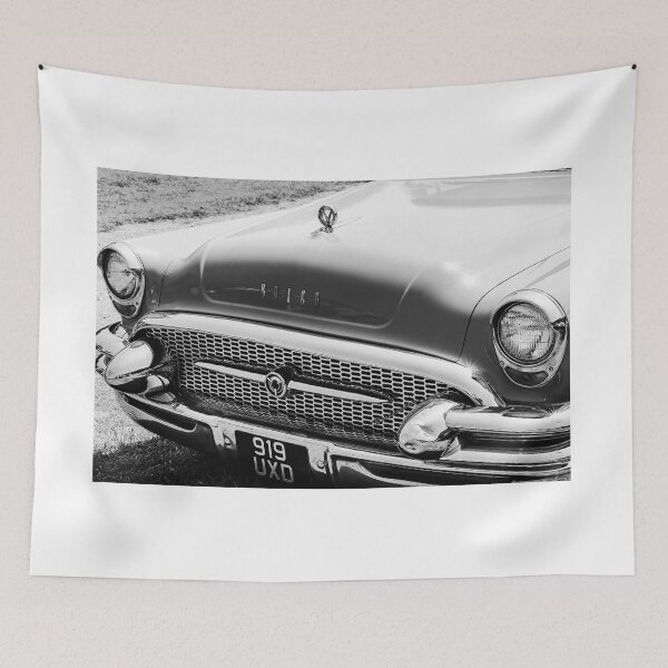 Item preview, A black and white image of the front of a green 1955 Buik Roadmaster on display at a car show designed and sold by Graham Cornall.