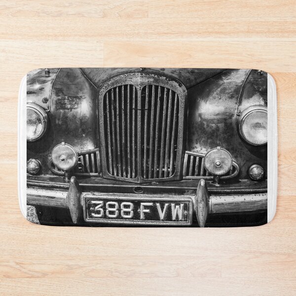 Item preview, A black and white image of the front of a 1956 Singer Hunter on display at a car show designed and sold by Graham Cornall.