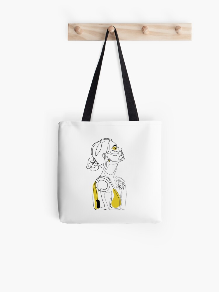 Bolsa de tela «Dibujo de cara en líneas, boceto de moda amarillo, arte de mujer.» de haryacoub1 | Redbubble