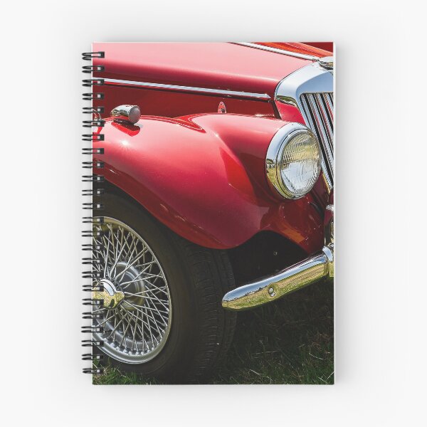 Item preview, The front of a red 1954 MG TF on display at a car show designed and sold by Graham Cornall.
