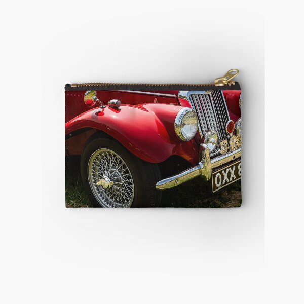 Item preview, The front of a red 1954 MG TF on display at a car show designed and sold by Graham Cornall.