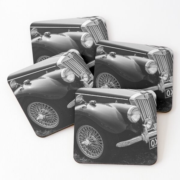 Item preview, A black and white image ofthe front of a red 1954 MG TF on display at a car show designed and sold by Graham Cornall.